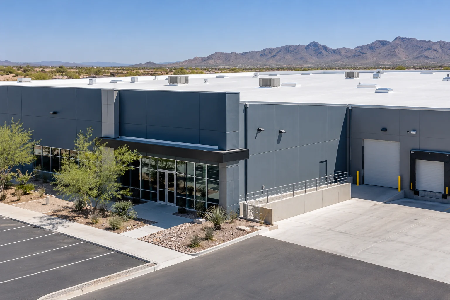 Commercial warehouse and office building with a low-slope roof
